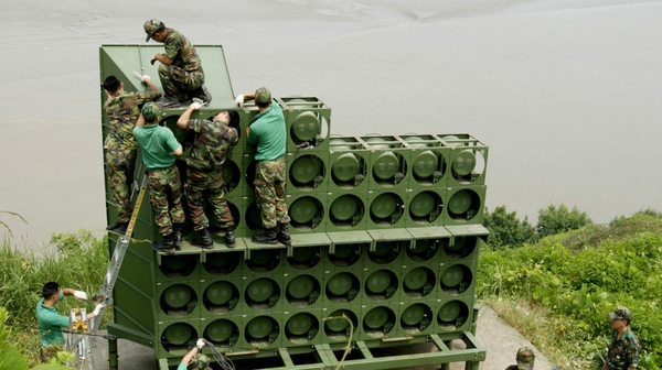 South Korea soldiers dismantle loudspeakers from an observatory near the with North Korea