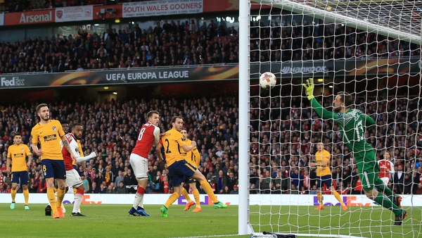 Jan Oblak makes a save in the Atletico goal