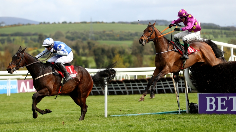 Paul Townend on Kemboy clears the last ahead of Dylan Robinson on A Rated