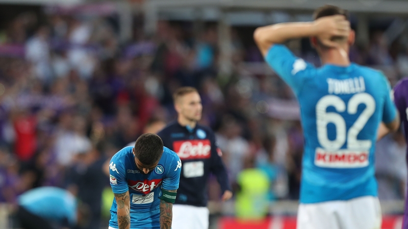 Napoli players dejected at full-time
