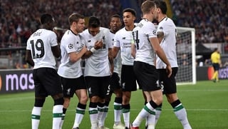 Liverpool players celebrate Sadio Mane's opening goal against Roma
