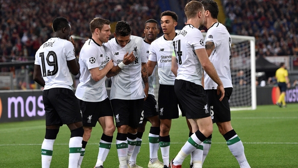 Liverpool players celebrate Sadio Mane's opening goal against Roma