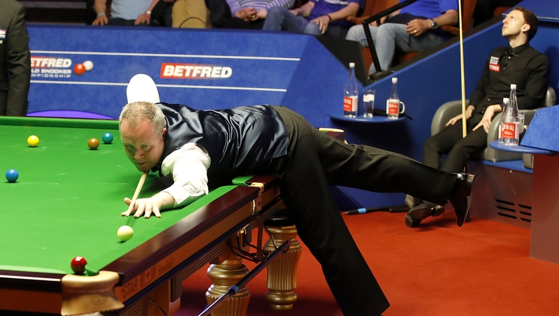 Judd Trump can't look as Higgins sinks another ball