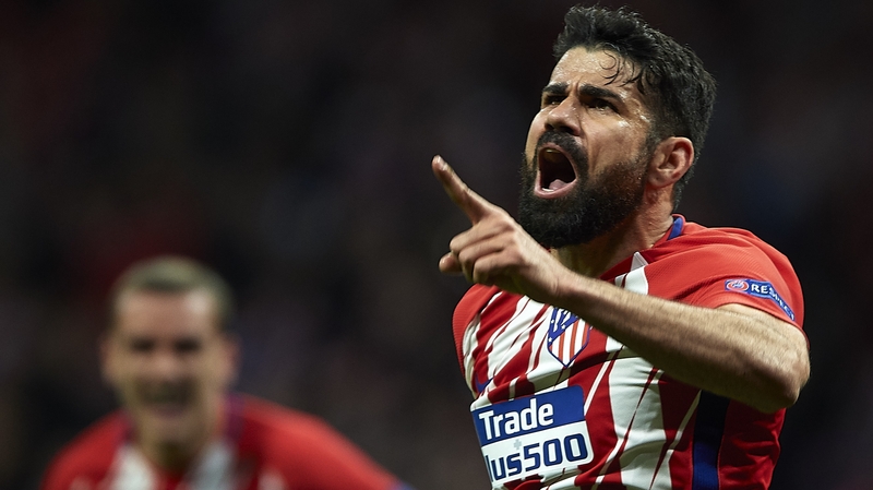 Diego Costa celebrates his second-half goal against Arsenal