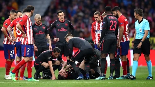 Laurent Koscielny may miss World Cup after being stretchered off with a suspected Achilles injury