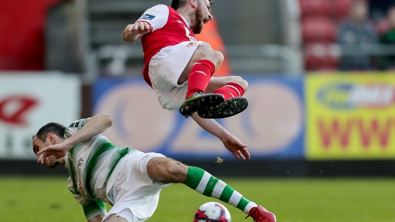 St Patrick's Athletic's Ryan Brennan is tackled by Joey O'Brien