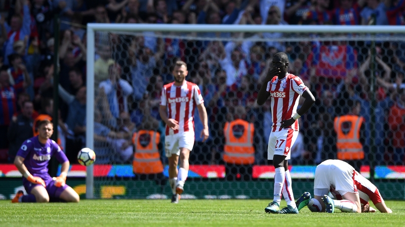 Stoke players despondent as their relegation from the Premier League is confirmed