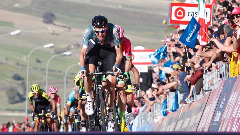 Tim Wellens crosses the finish line at stage four
