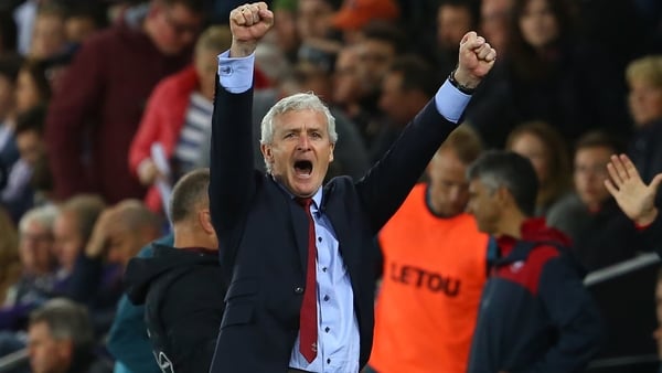Mark Hughes will stay on as manager of as club he once played for