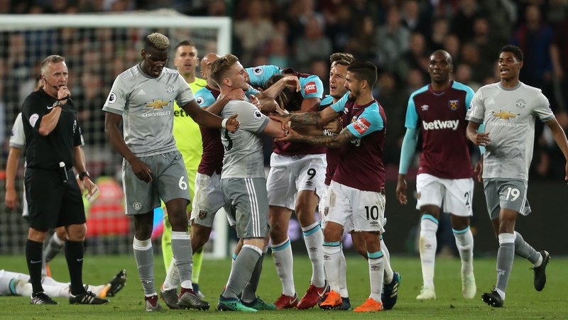 Tempers flare between West Ham United's Mark Noble and Manchester United's Paul Pogba