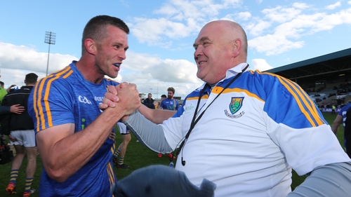 Rory Finn and John Evans celebrate at the final whistle