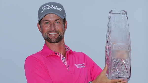 Simpson holds nerve to claim Players Championship