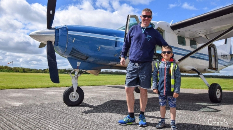Neil Bowditch, alongside seven-year-old Kacper Kacprzak (Pic: GoFundMe)