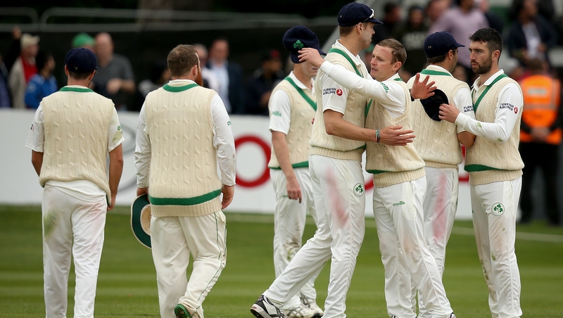 Boyd Rankin and William Porterfield embrace after the game