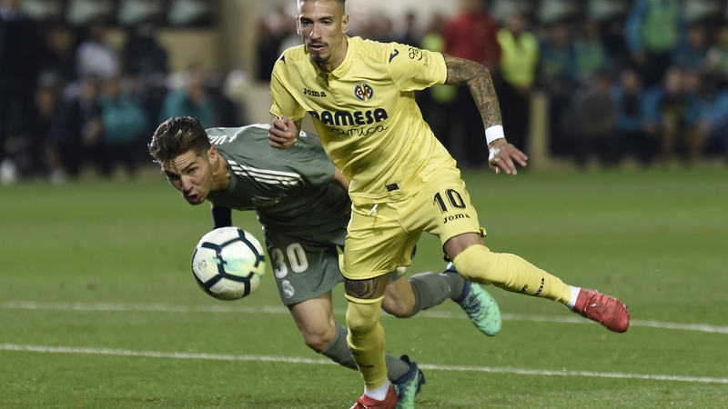 Luca Zidane (L) tries to block a shot on goal by Samuel Castillejo