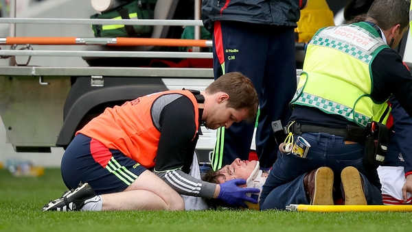 Robbie O'Flynn had a nasty collision with Clare's David McInerney and his team-mate Patrick Horgan.