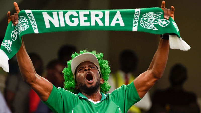 A Nigeria fan shows his devotion in the stands