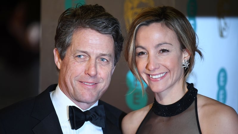 Hugh Grant and Anna Eberstein