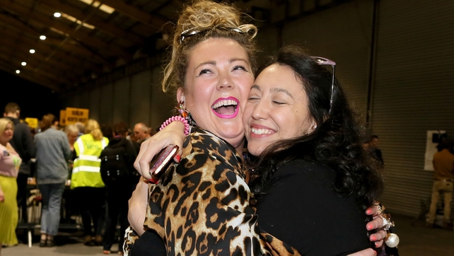 Yes supporters embrace at the RDS