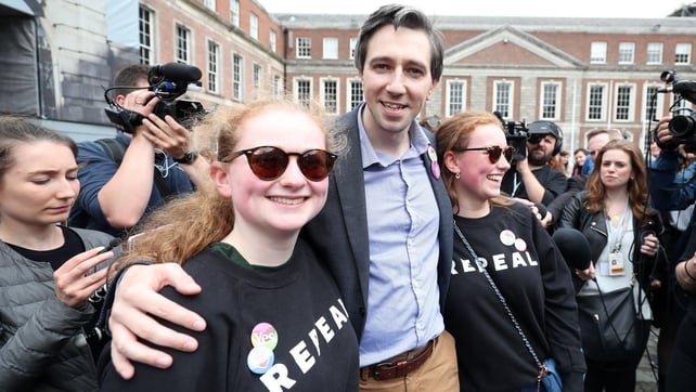 Minister for Health Simon Harris greets Yes supporters at Dublin Castle