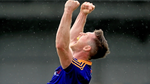 Michael Quinn celebrates at the full-time whistle