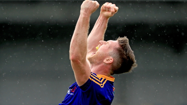 Michael Quinn celebrates at the full-time whistle