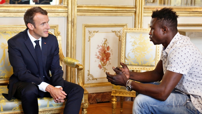 Mamoudou Gassama meets French President Emmanuel Macron at the Elysee Palace