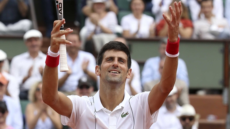 Novak Djokovic salutes the crowd