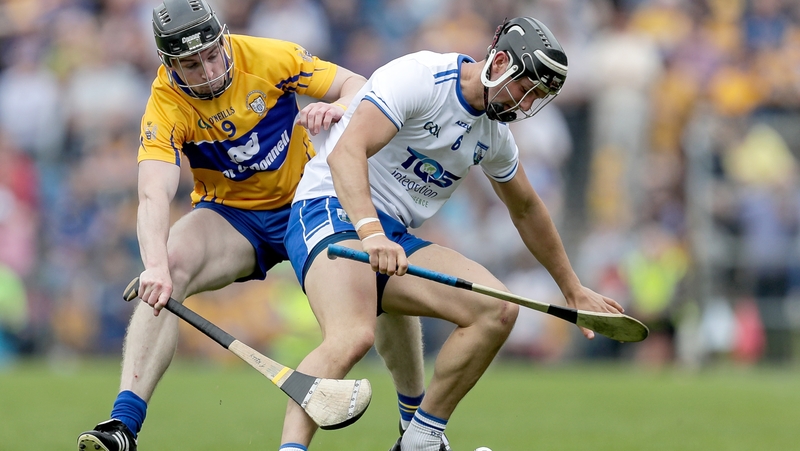 Waterford's Darragh Fives and Tony Kelly of Clare in action at Cusack Park