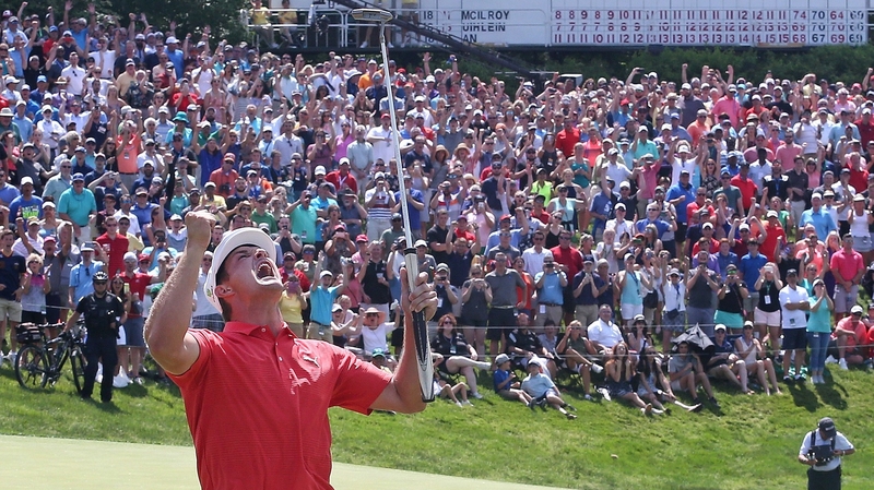 An elated Bryson DeChambeau celebrates his win