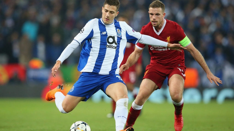 Diogo Dalot (L) in action for Porto against Liverpool last season