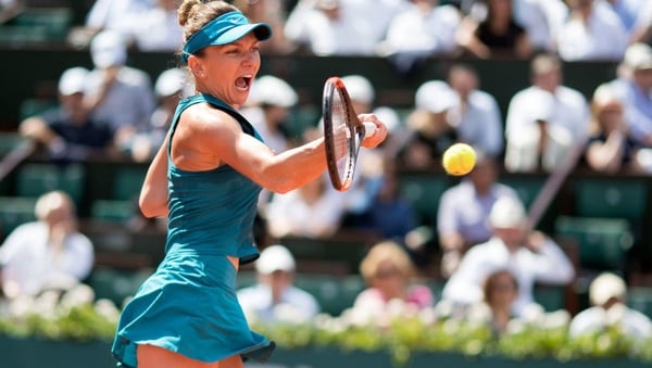 Simona Halep in action against Garbine Muguruza in the semi-finals