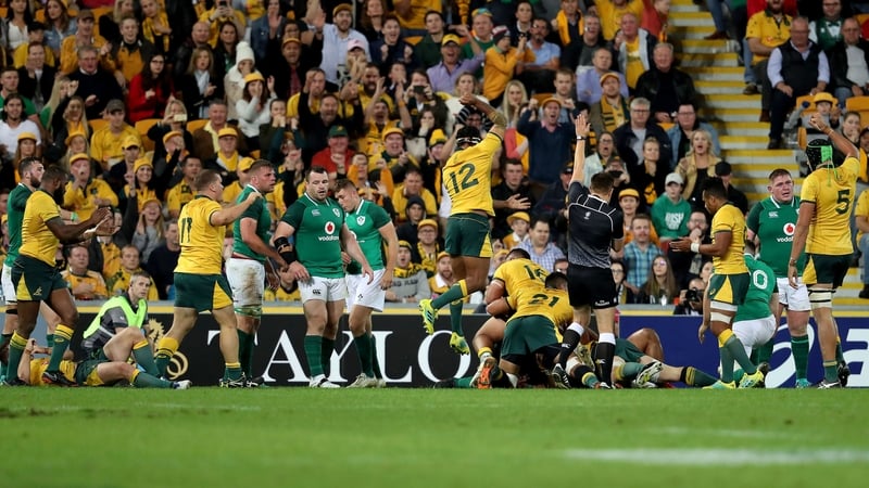 Australia players celebrate David Pocock's try
