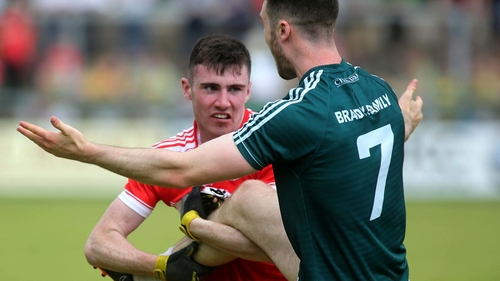 Patrick Coney tussles with Kevin Flynn