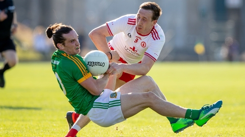 Meath's Cillian O'Sullivan and Colm Cavanagh of Tyrone