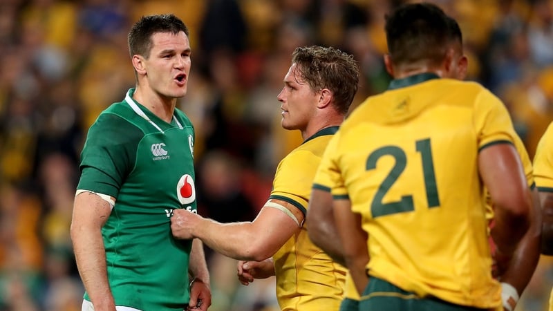 Johnny Sexton in an exchange with Australian players after the final whistle