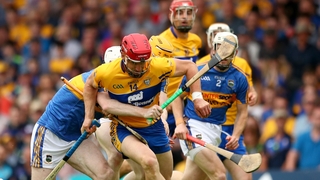 Clares' John Conlon battles with Séamus Kennedy and Donagh Maher of Tipperary