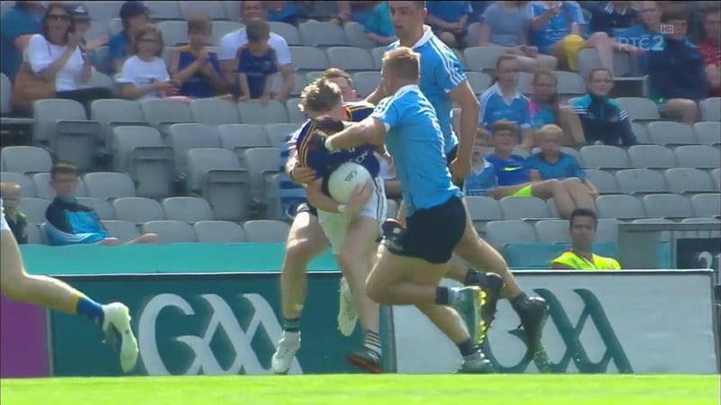 Jonny Cooper clashes with Dessie Reynolds