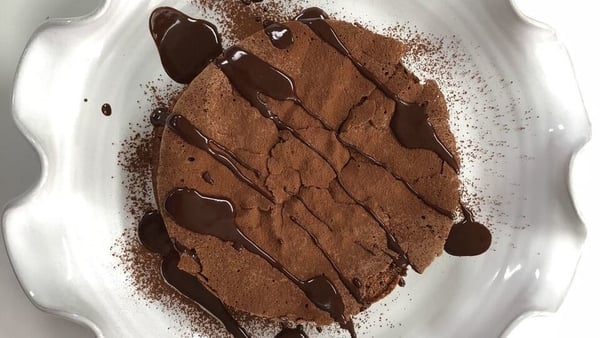 Chocolate Souffle Cake with Chocolate Sauce and Raspberries