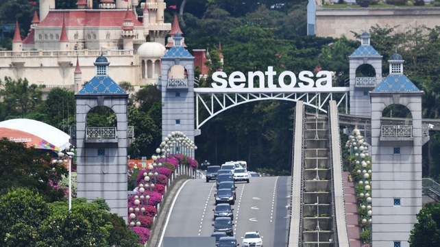 The motorcade transporting North Korea's leader Kim Jong-un leaves Sentosa island after taking part in the summit