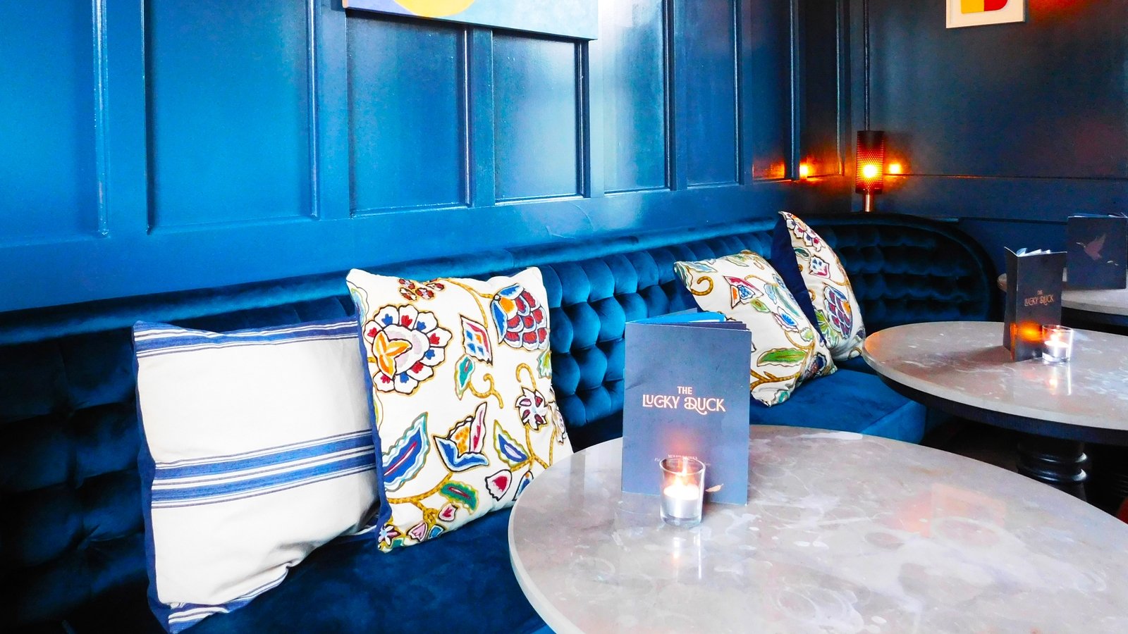Jewel-toned velvet and wall-panels