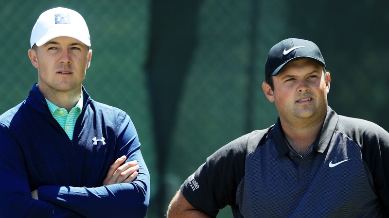 Jordan Spieth and Patrick Reed wait together during a practice round at the US Open