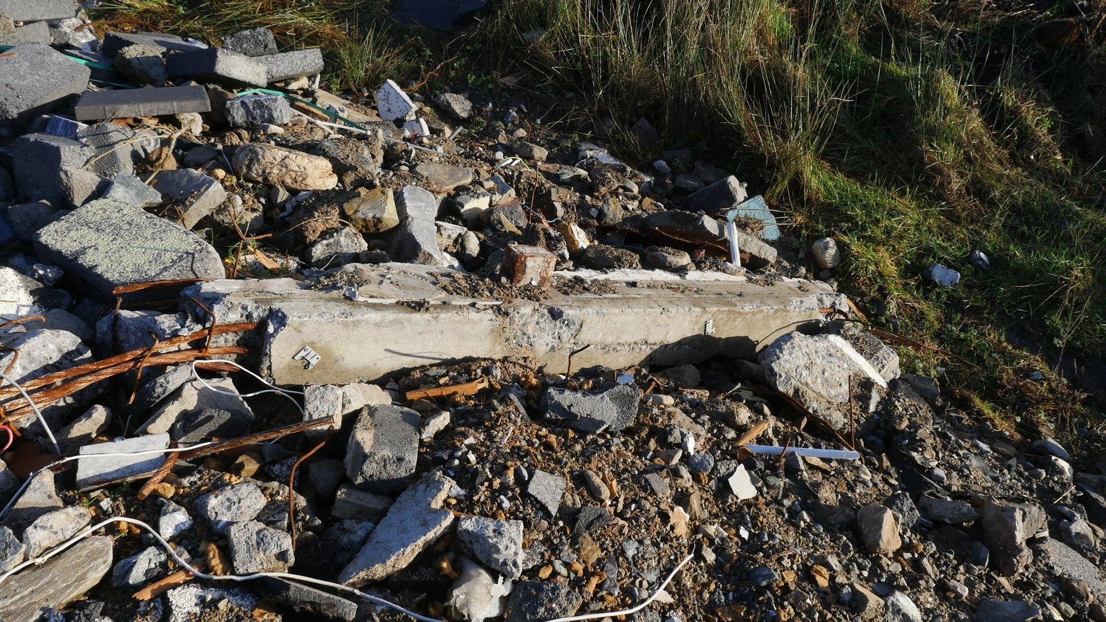 Demolition waste from Clifden Community School left at an unpermitted site.