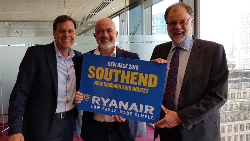 Warwick Brady (Stobart), David O'Brien (Ryanair), and Iain Ferguson (Stobart) celebrate the announcement