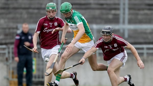 Offaly's Brian Duignan with Ian O'Shea and Caelom Mulry of Galway