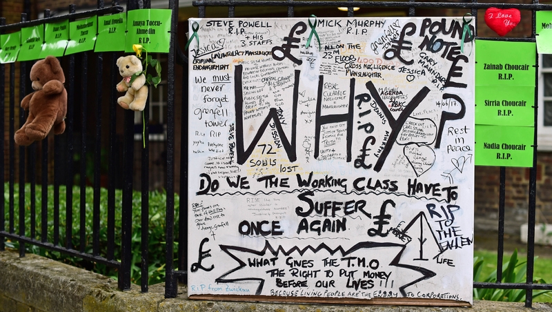 Part of the wall of handwritten tributes to the victims of the fire which claimed 72 lives