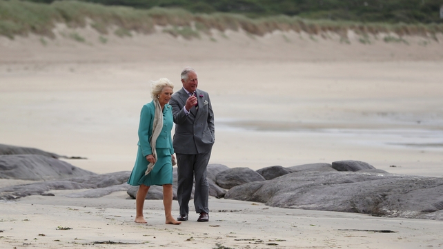 Charles and Camilla walk on Derrynane beach in Co Kerry during the royal tour of Ireland