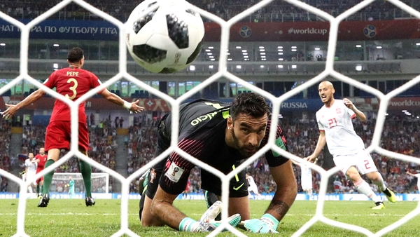 Rui Patricio watches Diego Costa's shot billow the net