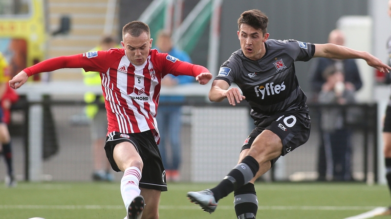 Dundalk's Jamie McGrath and Derry City's Rory Hale - the visitors cantered to a 4-0 win in the Brandywell