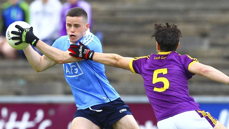 Dublin's Ross McGarry and Dylan Furlong of Wexford in action
